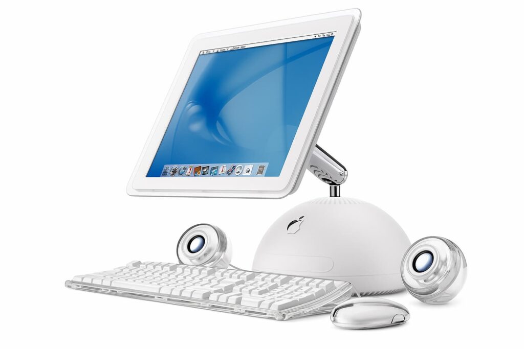 iMac G4 tournesol de 2003 avec écran plat et haut-parleurs transparents, symbole du design Apple durable et recyclable